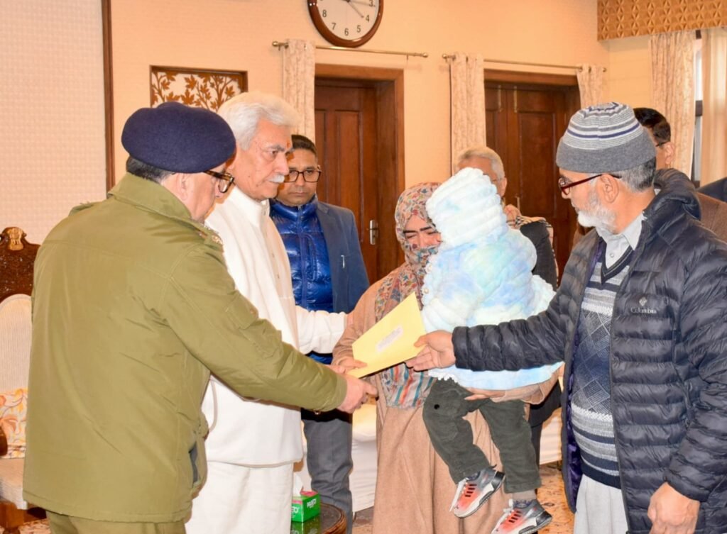 J&K LG Manoj Sinha stands with Nowgam, offering appointment letters as a mark of respect