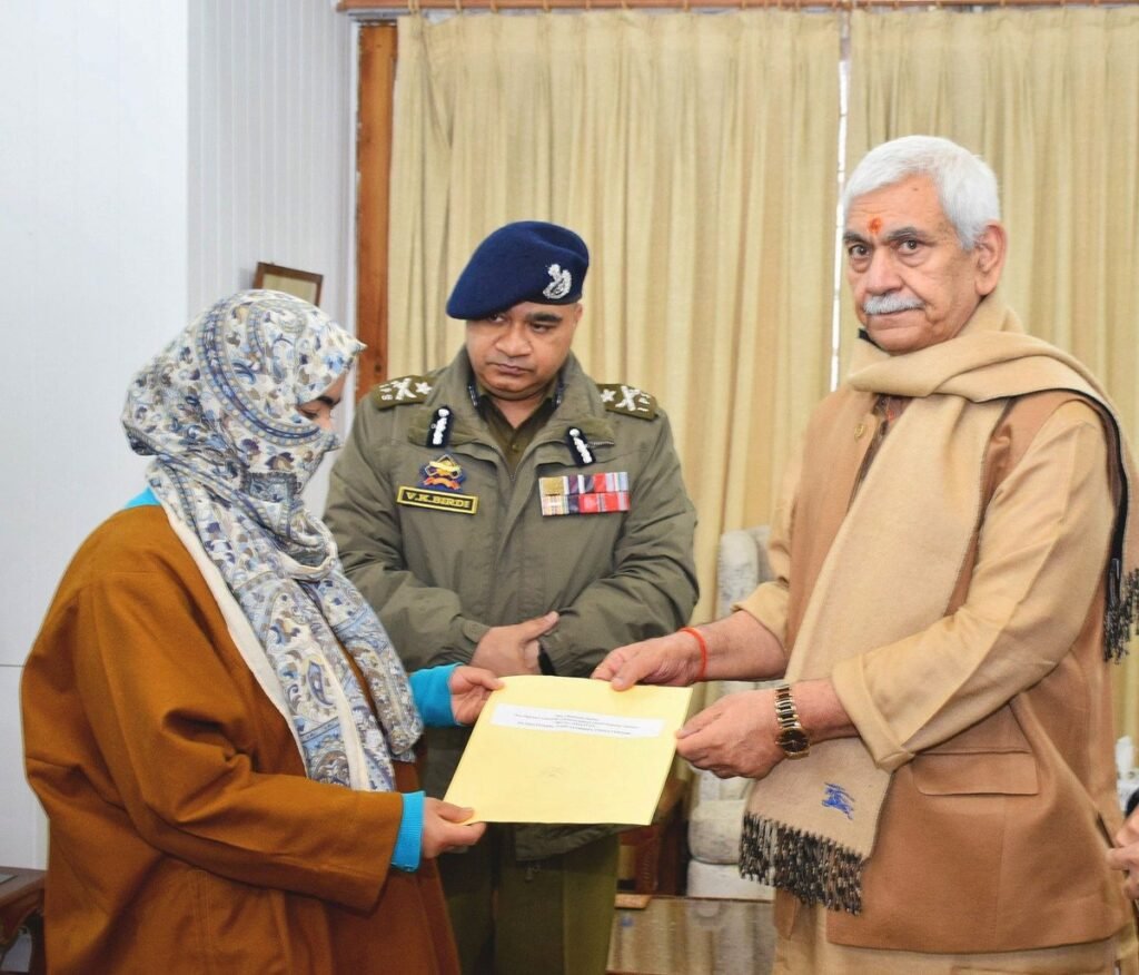 Manoj Sinha hands over compassionate appointment to wife of martyred Jammu and Kashmir police constable