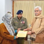 Manoj Sinha hands over compassionate appointment to wife of martyred Jammu and Kashmir police constable