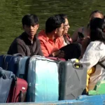 Tourists flock to Srinagar’s Dal Lake, enjoy pleasant weather and shikara rides
