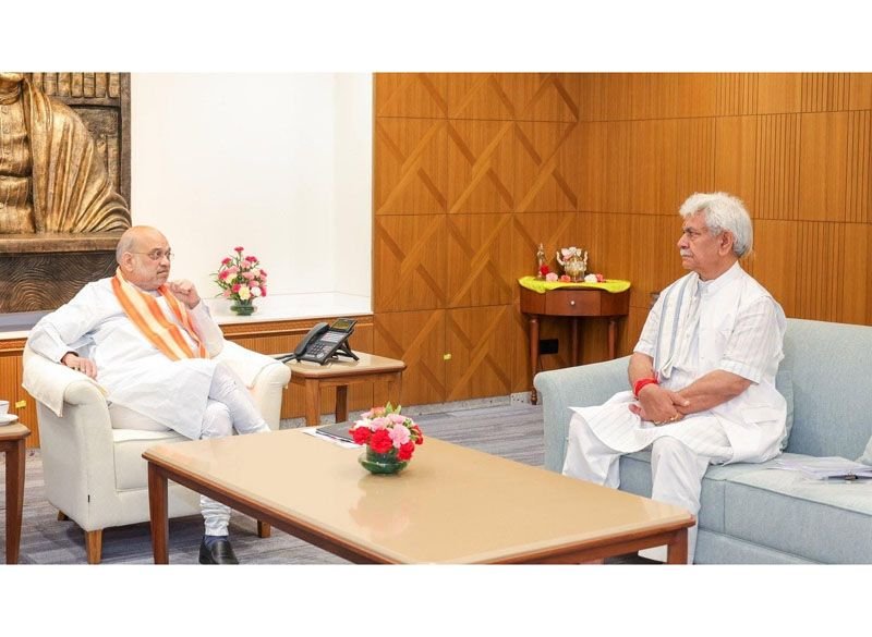 LG Manoj Sinha meets Union Home Minister Amit Shah, reviews security situation in Jammu and Kashmir