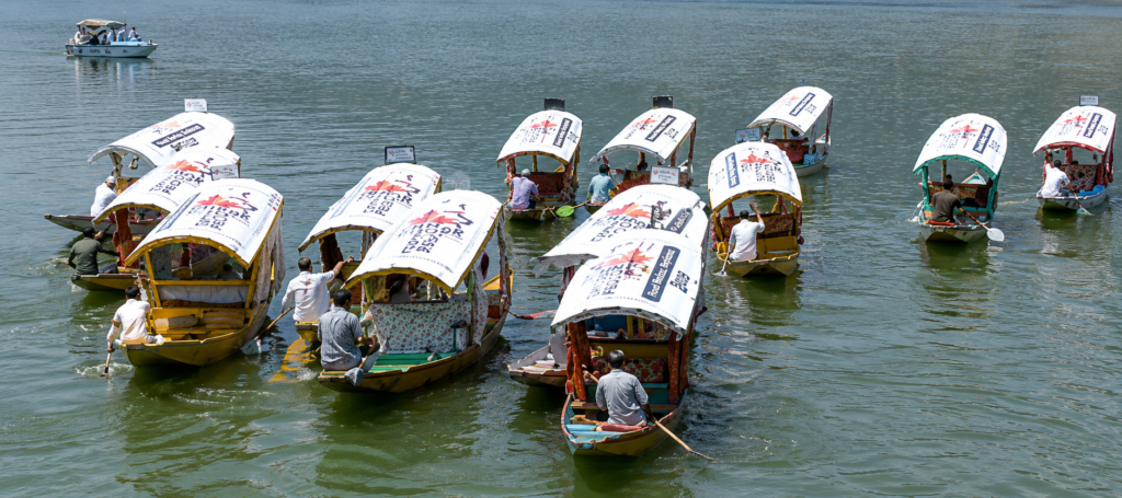 DC Akshay Labroo flags off Chinar Book Festival Shikara Rally on Dal Lake