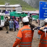 CRPF personnel carry ailing Amarnath Yatra devotee to safety at Baltal
