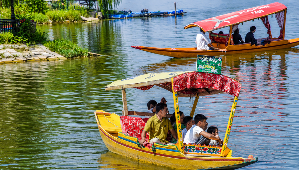 Tourists throng Srinagar’s Dal Lake to escape summer heat