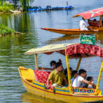 Tourists throng Srinagar’s Dal Lake to escape summer heat