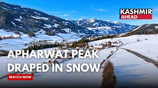Gulmarg Witnesses Season’s First Snowfall as Tourists Admire the Scenic Beauty of Apharwat Peak